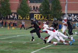 Greene breaks away for a touchdown. Photo by Frank Avenilla