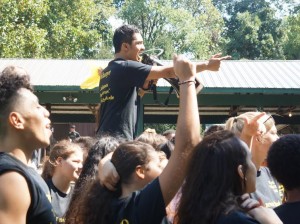 Khan pumps up students at Senior Unity Day. Photo courtesy of Paloma Zegarra 